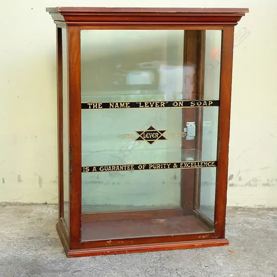 A colonial counter top mahogany display cabinet