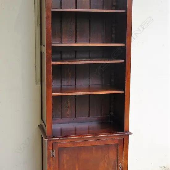 A Georgian country style tall narrow oak bookcase
