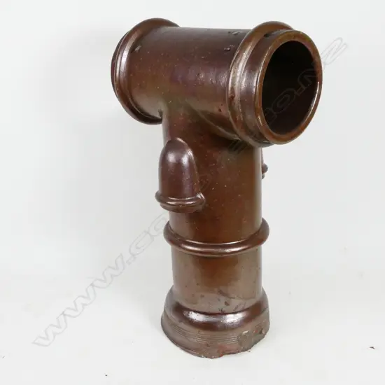 A T-form chimney pot by H. Hill Wellington