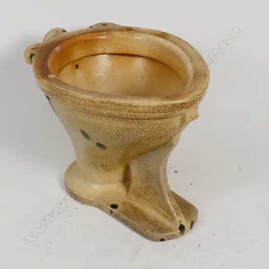 A colonial salt glazed toilet pan