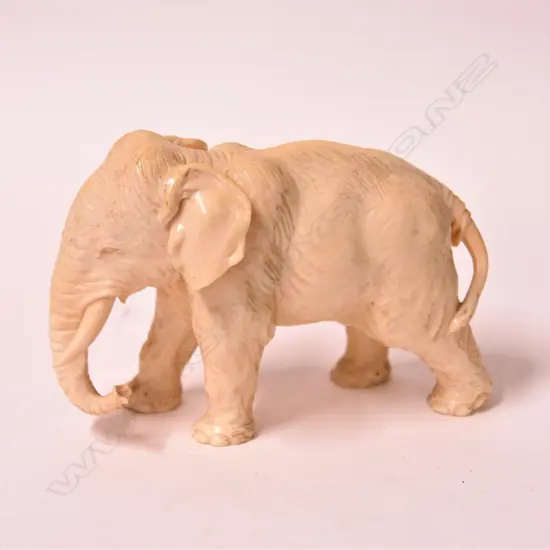An early 20thC finely carved ivory Asian elephant