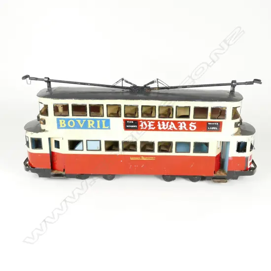 A vintage handmade tinplate London Transport trolley bus