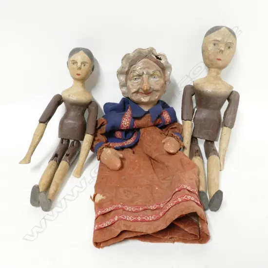 Two old wooden jointed dolls and a hand-held puppet