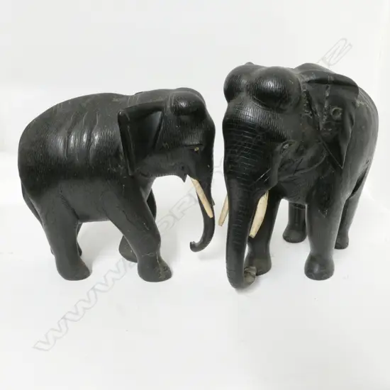 Two carved ebony elephants