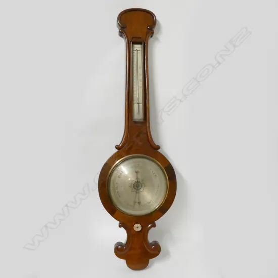 A George III mahogany banjo barometer