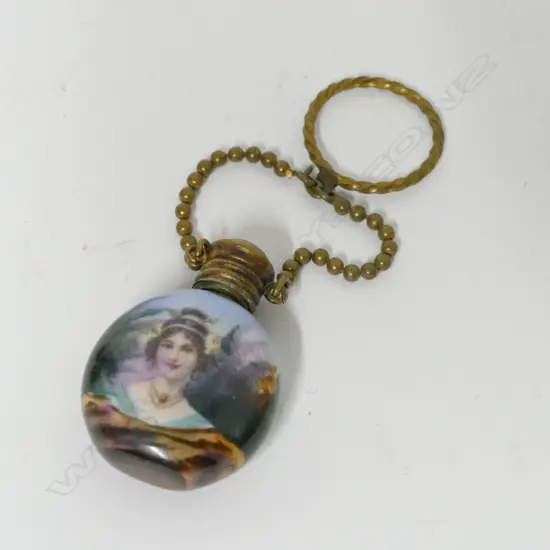 A small Edwardian china scent bottle