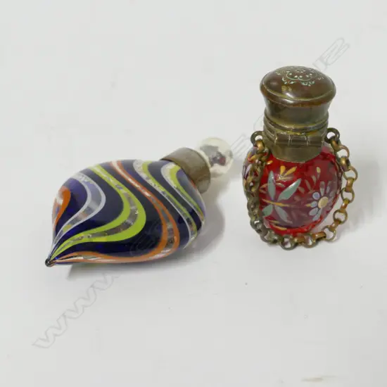 Two small glass perfume bottles