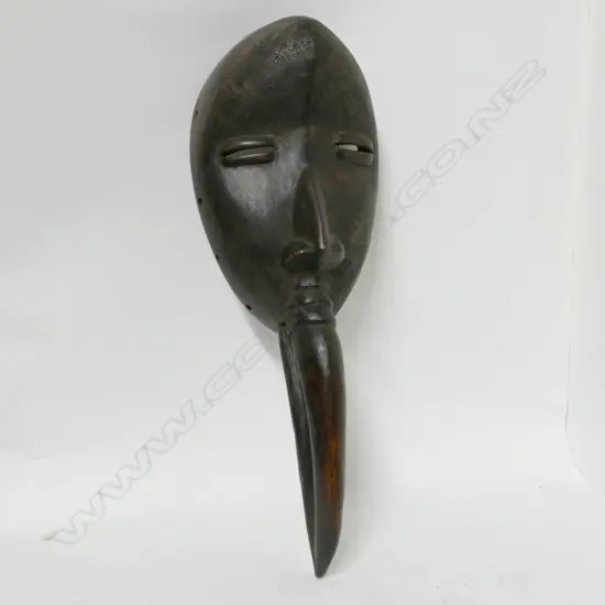 A carved Mahou bird mask