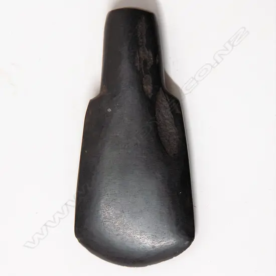 An old argillite adze