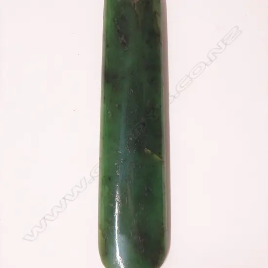 A 20thC large greenstone pendant