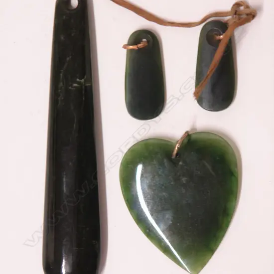 Four 20thC pounamu carved pendants
