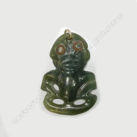 An old Maori pounamu (bowenite) small hei tiki