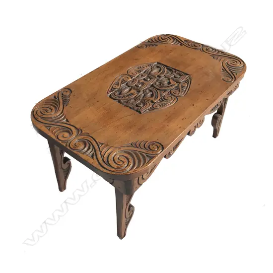 A vintage folk art carved kauri table