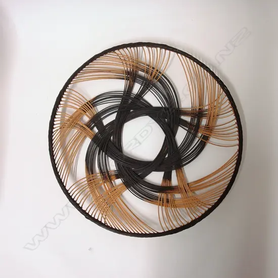 A Ruth Castle large 'Sunflower' pattern decorative woven rattan core dish