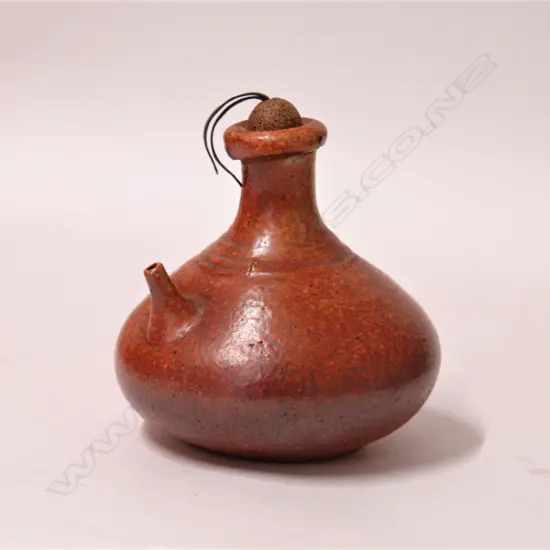 A Len Castle shino glazed oil bottle