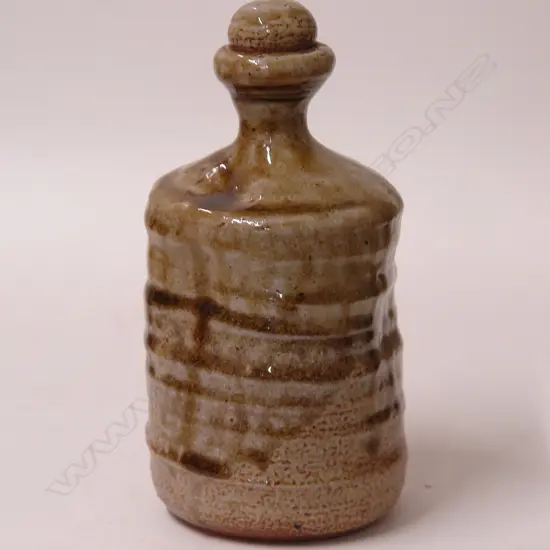 A Chester Nealie early lidded bottle