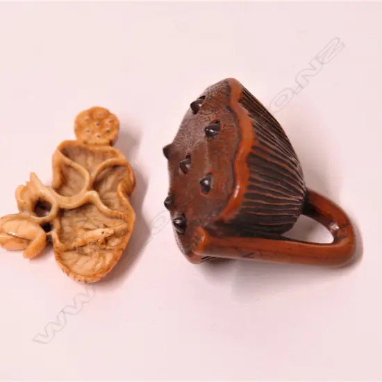 A 19thC Japanese boxwood netsuke and small ivory carving