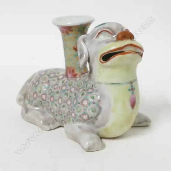 A Chinese famille rose shishi candle stand