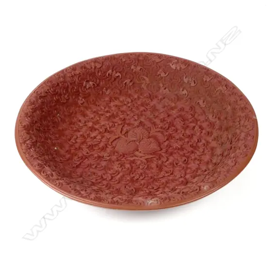 A bowl replicating cinnabar lacquer