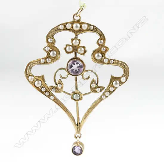 An Edwardian Art Nouveau 9ct. gold pearl and amethyst pendant
