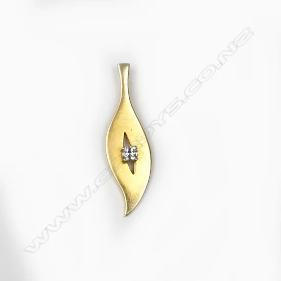 A retro 18ct. gold and diamond pendant