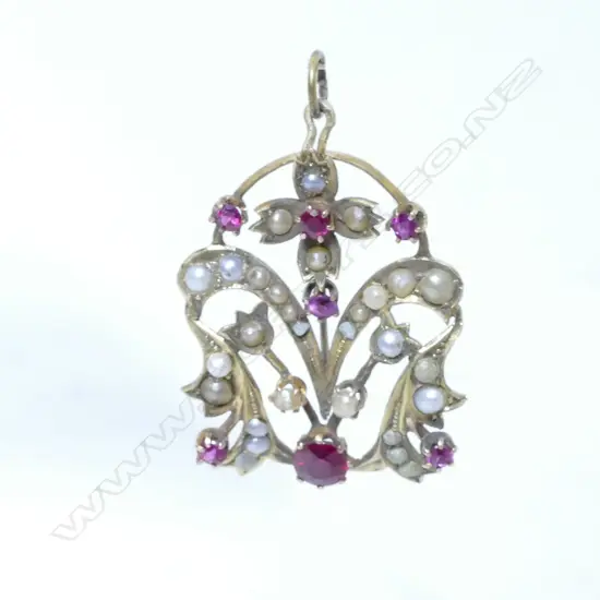 An Edwardian 15ct. yellow gold synthetic ruby and seed pearl pendant