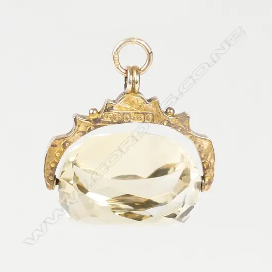 A 9ct. rose gold and citrine fob spinner