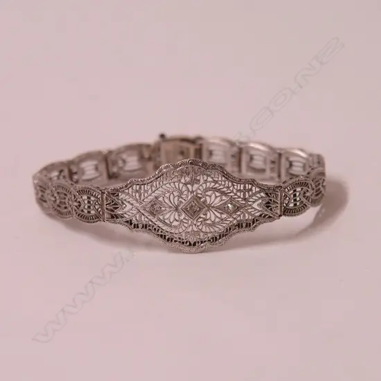 A vintage Art Deco style SILVER filigree lady's bracelet