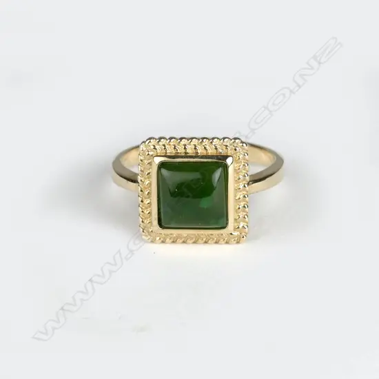 A 14ct. gold and pounamu ring