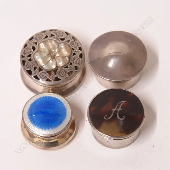 Four early 20thC small silver lidded vanity boxes