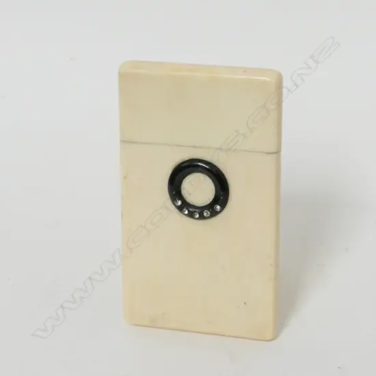 A small plain ivory card case