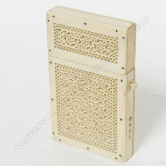 A small finely carved ivory card case