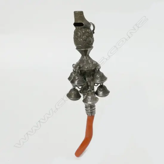 An impressive Victorian silver and coral rattle/teething ring