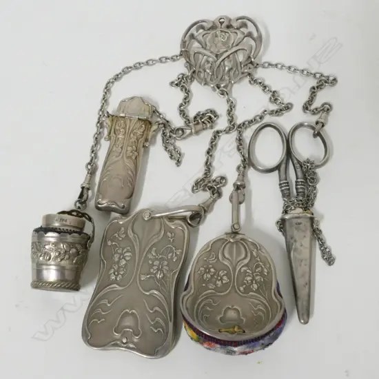 An Edwardian Art Nouveau silver chatelaine