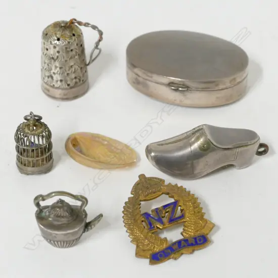 Five small silver trinkets