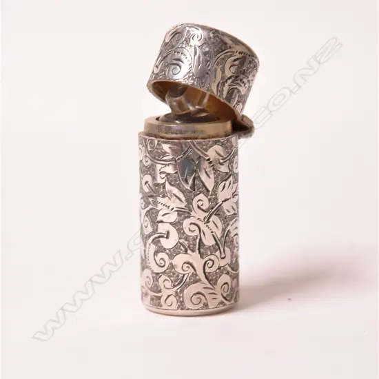 A late Victorian silver cylinder scent bottle