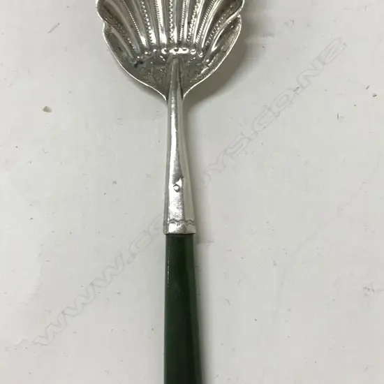 A silver and pounamu handled jam spoon