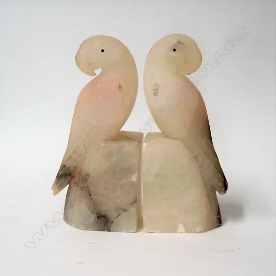 A pair of Art Deco alabaster parrot bookends
