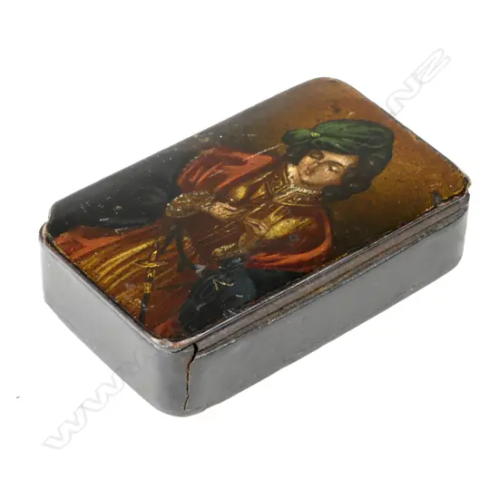 A small papier maché snuff box
