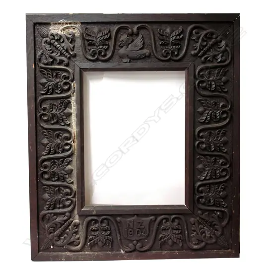 A carved oak 'N.Z. 1904' large picture/mirror frame