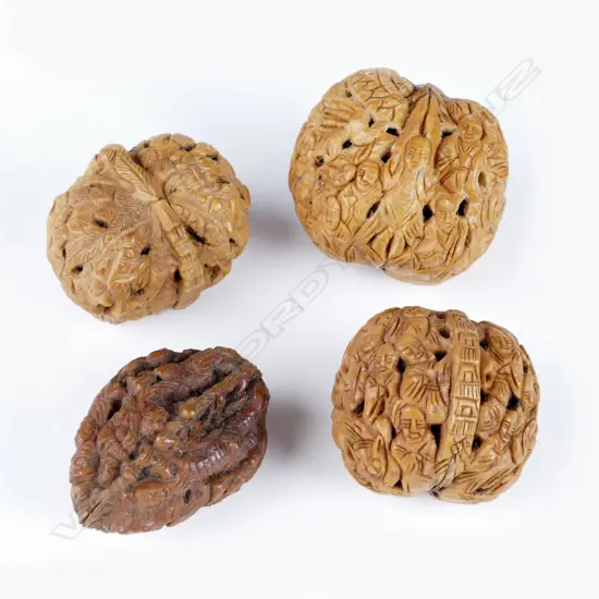 Four old Chinese finely carved walnuts