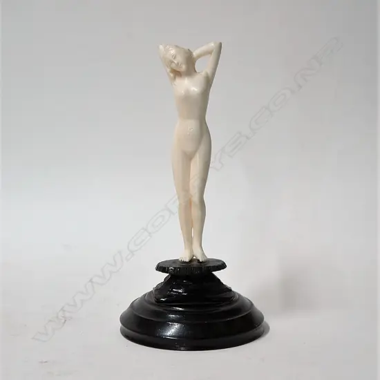 A Chinese carved ivory medicine doll