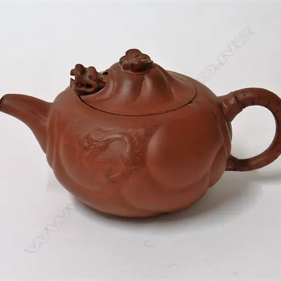 A Chinese Yixing circular teapot