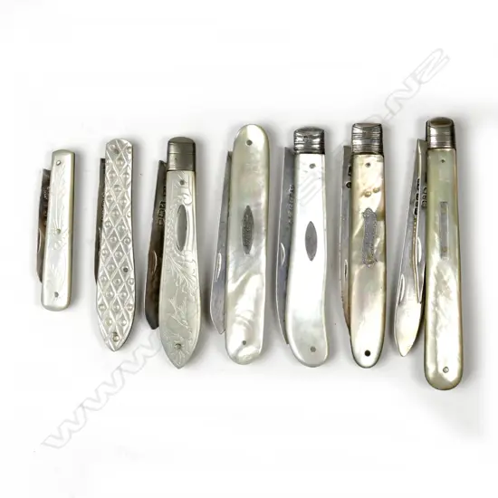 Seven silver and mother of pearl fruit knives