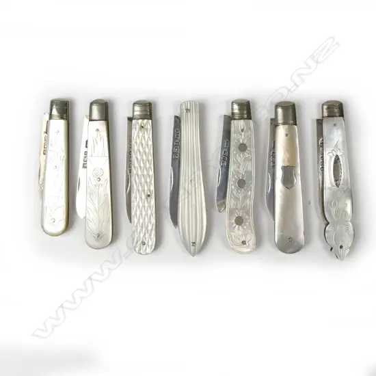 Seven silver and mother of pearl fruit knives