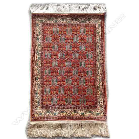 A small finely knotted Persian silk rug