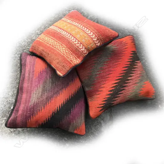 Three kilim cushions
