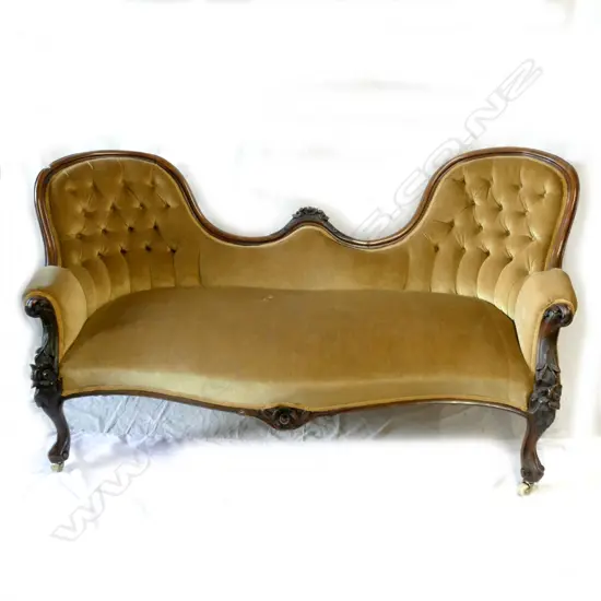 A Victorian walnut double-ended settee of French style