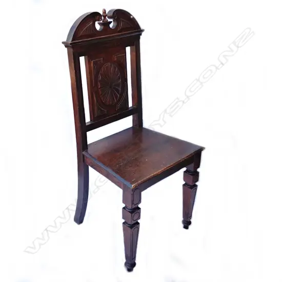 A Victorian oak hall chair