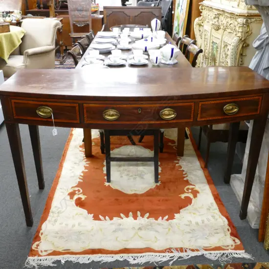 A Victorian mahogany bowfront console table